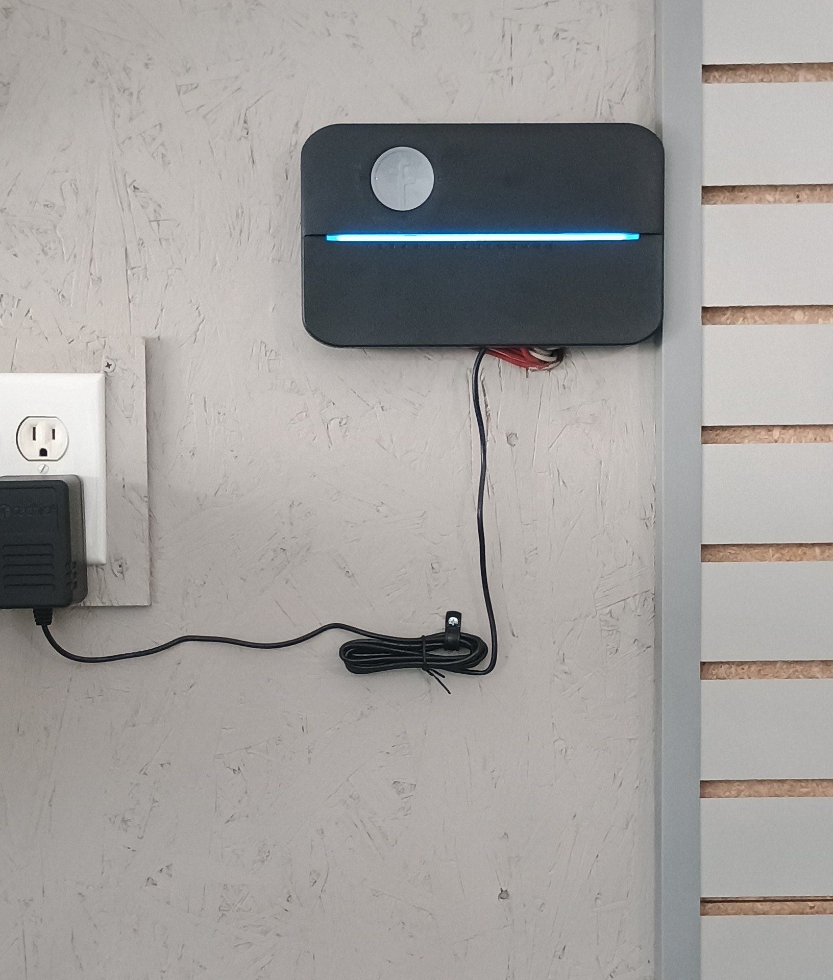 Rachio smart irrigation controller mounted in garage with clean wire connections